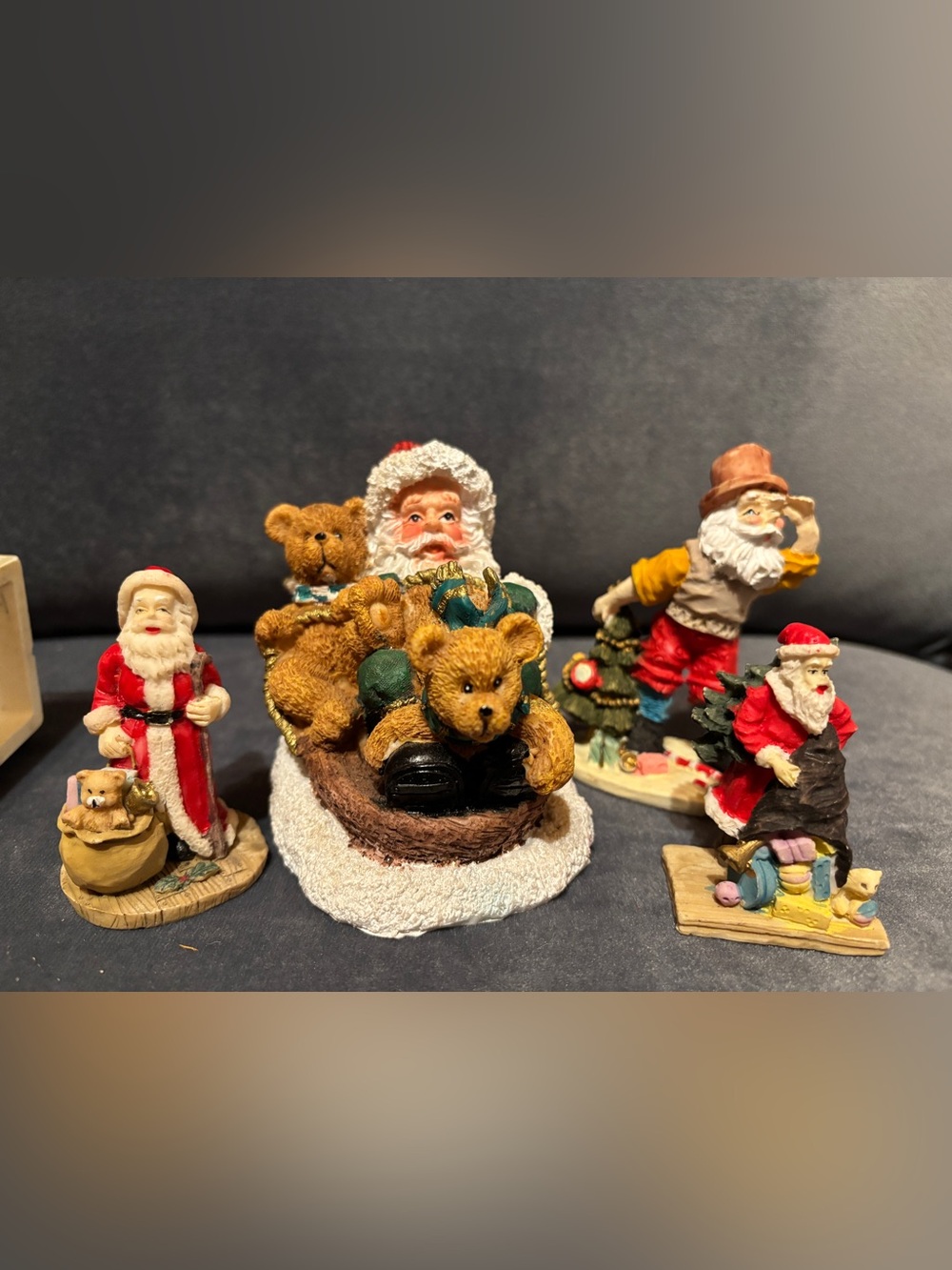 Set of 4 different Santas Holiday Figurines vintage